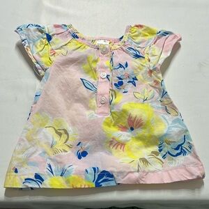 Carter’s button down pink floral blouse.  Size 3 months.  Gently used